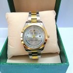 Montre mixte couleur or et argent